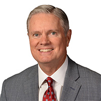 Professional headshot photo of John Weitzel