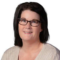 Professional headshot photo of Kim Wallace